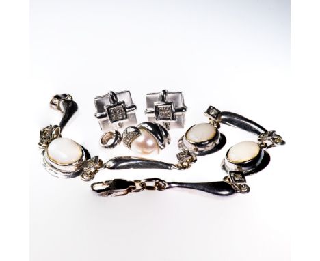 A CULTURED PEARL PENDANT, set with a single cultured pearl; together with a pair of 18ct white gold and diamond studs, stampe
