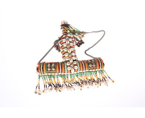 A TRIBAL COWRIE SHELL AND BEADED FLASK, T-shaped with plug stopper and chain. 22cm wide