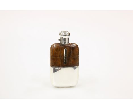 AN EDWARDIAN SILVER-MOUNTED HIP FLASK, WALKER &amp; HALL, SHEFFIELD 1903, with hinged twist top, partly brown leather covered