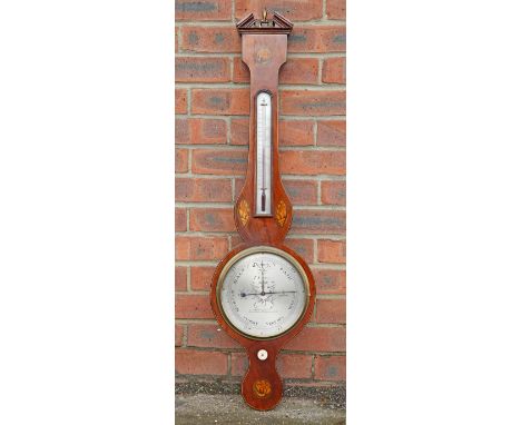 A GEORGE III INLAID MAHOGANY BAROMETER, SIGNED I SCHALFINO, with conch shell inlay, silvered 8-inch dial and thermometer. 97.
