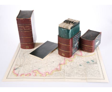 A SET OF 19TH CENTURY CANVAS BACKED ORDNANCE SURVEY FOLDING MAPS OF GREAT BRITAIN, in two book-form boxes with gilt titled sp