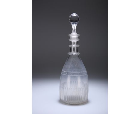 A LATE 18th CENTURY IRISH CUT-GLASS GIN DECANTER,&nbsp;of mallet form, with four ring neck, the body part fluted and with an 