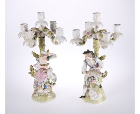 A PAIR OF DRESDEN PORCELAIN FIGURAL FIVE-LIGHT CANDELABRA, c. 1900, the stems modelled with a shepherd and shepherdess, each 