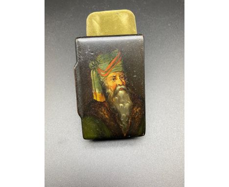 An Antique paper mache hand painted snuff box. Depicts an elderly foreign gentleman. [8cm in length] 