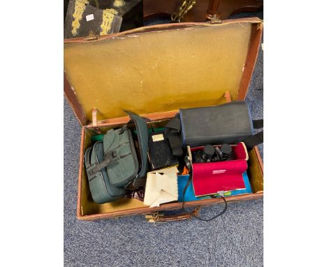 A Vintage case containing Binoculars and Camcorder etc 
