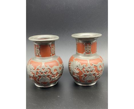 A Pair of Chinese Terracotta and pewter overlay vases. Stamped Wen Hua, 190 North Gate, Wei Hai Wei City. [12.5cm in height] 