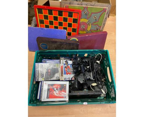 A Crate containing Slimline PS2 Console, controllers, games and various vintage board games 