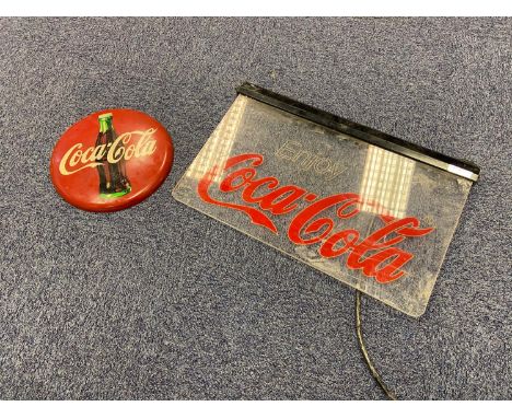 A 1990 Coca Cola Tacker- Type Button adverting sign together with a vintage light up Coca Cola bar sign. 