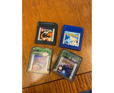 Four vintage game boy games to include Pokemon Blue, R- Type DX, Xena Warrior Princess and Harry Potter and the Philosophers 