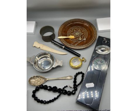 A Selection of collectables. Includes Pewter exhibition napkin ring, Pocket watch, Sheaffer fountain pen, Quaich, Silver lid,