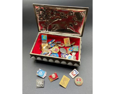 An oriental plated and white painted trinket box together with various Russian pin badges etc. 