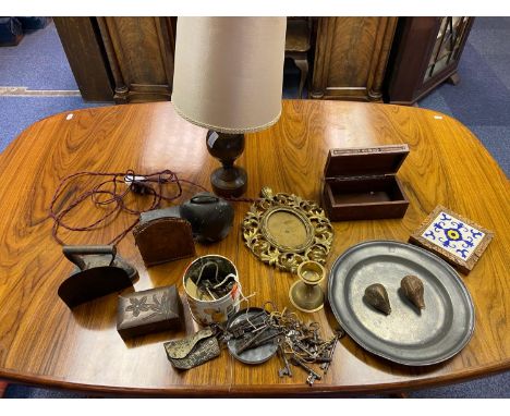 A Mixed lot of collectable odds to include carved stone fruit, Pewter dinner plate, various antique keys, antique cow bell an