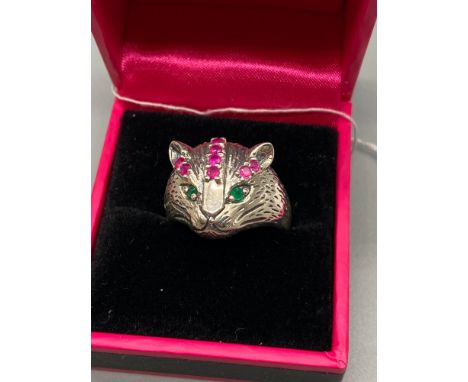 A Silver 925 ladies ring in the form of a cat designed with various coloured stones. 