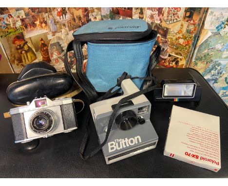 A Vintage Polaroid Land Camera 'The Button' comes with flash and carry bag. Together with a vintage Pentona II Camera and cas