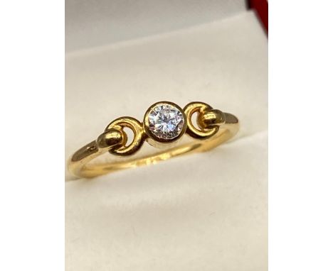 A Beautiful example of a ladies 18ct yellow gold single stone diamond ring. [0.20cts] [Ring size J][2.38grams] 