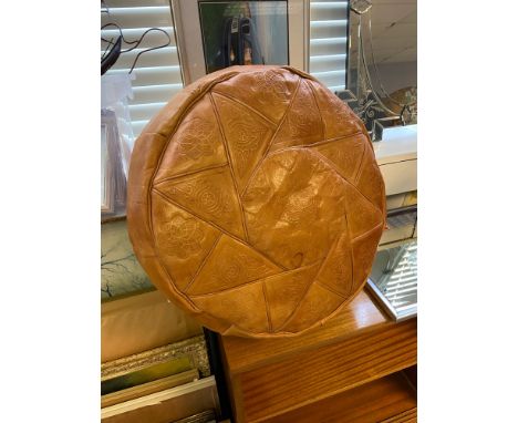 An Arabic style leather stool/ pouffe 