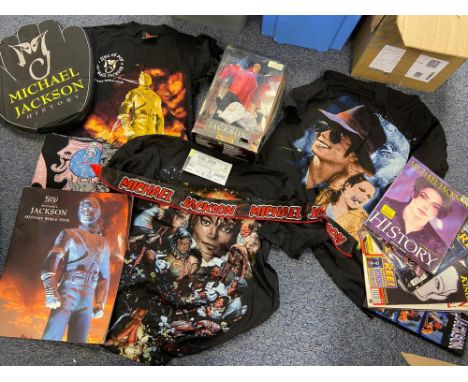 A Selection of Michael Jackson memorabilia to include doll and foam hand. 