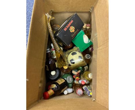 A Box containing a selection of vintage miniatures to include Drambuie, Old St Andrews clubhouse boxed miniature, and various