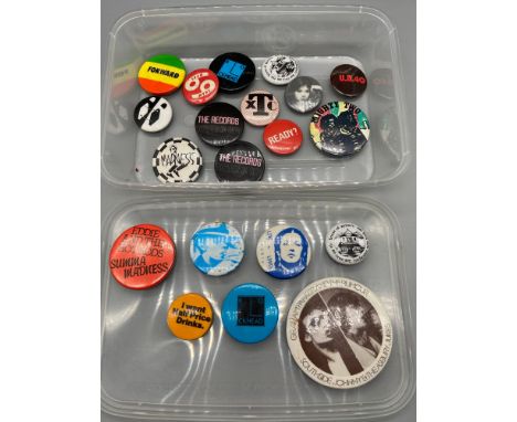 A Quantity of vintage pin badges which include The Madness &amp; U.B.40 