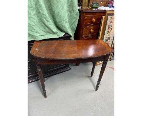 A Victorian Mahogany D End console table. Designed with turn leg supports 