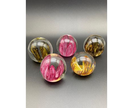 5 Various vintage Art Glass Strathearn paperweights. 
