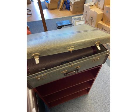 Two stylish vintage travel cases produced by Fender Edge and May Fair. 