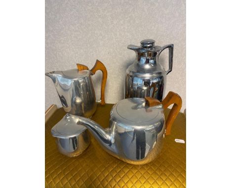Three piece Picquot ware tea/ coffee set [Missing cream jug] together with Thermos flask. 