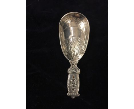 Silver caddy spoon marked Birmingham 1896. 26.3gms