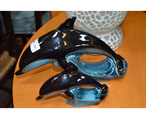 Poole Pottery - two prancing dolphins the larger version being 18.5 cm high to the fin tip