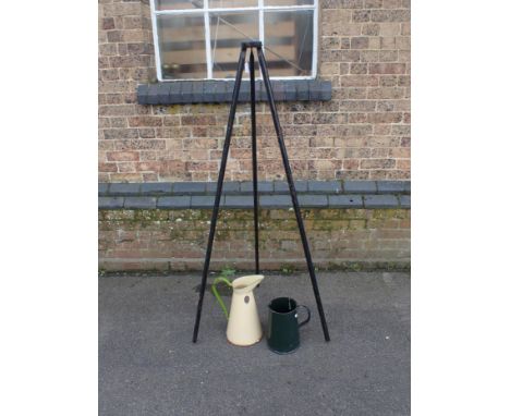 TWO LARGE OLD ENAMEL JUGS and a vintage ebonised camera tripod (3)