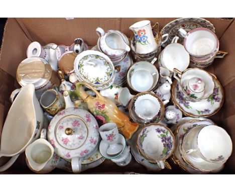 A COLLECTION OF FLOWERY CHINA including part tea services by Aynsley, Adderley, Salisbury etc, and other ceramics
