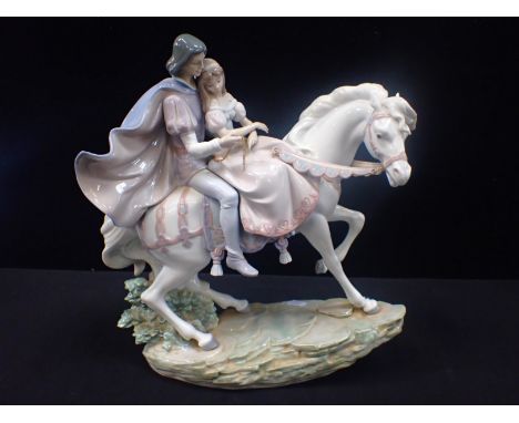 LLADRO: A LARGE GROUP 'LOVE STORY' lovers on horseback 36cm high