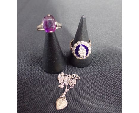 AN ENAMEL AND MARCASITE MOURNING RING a St Christopher pendant necklace, and a purple paste dress ring (3)