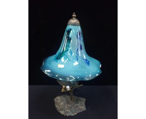 A BRONZE TABLE LAMP WITH GLASS SHADE of naturalistic form 50cm high (untested)