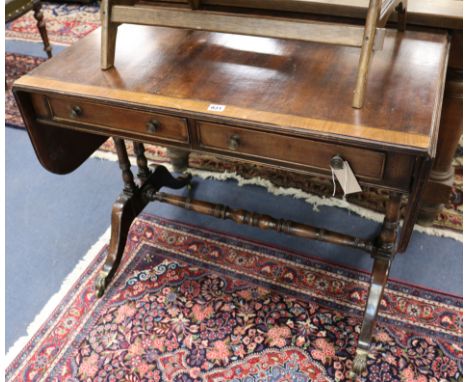 A Regency cross banded mahogany sofa table W.93cm