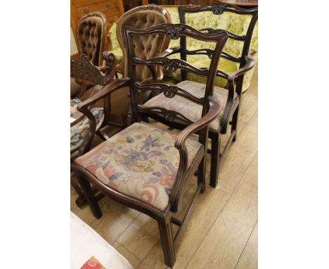 A pair of Chippendale style mahogany carver chairs