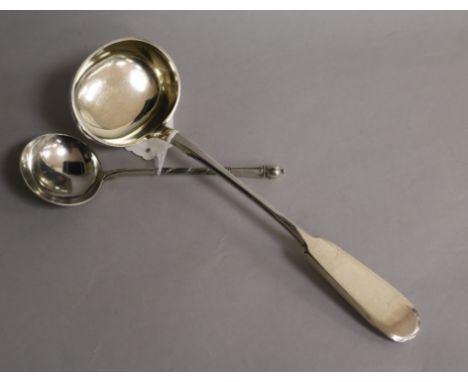 A late 19th century Russian 84 zolotnik silver fiddle pattern soup ladle, 1889 and a Russian silver and niello sauce ladle.