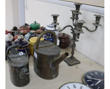 A Victorian plated five light candelabrum and two Victorian copper water cans (3)