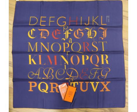 A Hermes scarf and knotting cards, all boxed