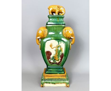 A Chinese green and ochre Sancai glazed elephant vase on stand - 20th&nbsp;century, the flattened, square baluster vase with 