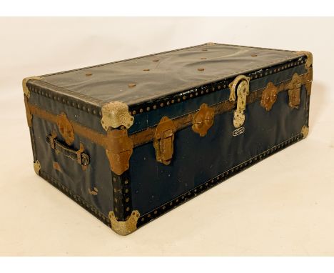A vintage London Mossman black and navy blue trunk - LWH 91 x 52 x 34cm, the hinges rusty.