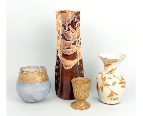 Four pieces of vintage and studio pottery - including a stoneware vase of squat ovoid form with a shaped cut rim, the neck wi