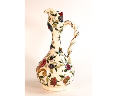 Unusual Zsolnay Pecs earthenware ewer with twist handle. Body is florally decorated after early Persian ceramic designs. Mout