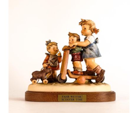 Hummel figure group by Goebel, Scooter Time, on wooden plinth, H.17cm. Boxed with certificate 