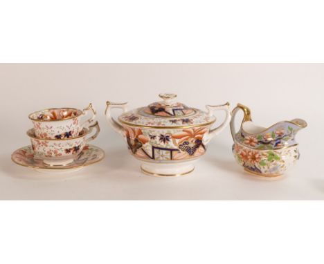 Three Georgian porcelain items of tea ware in the manner of Spode to include an Imari True trio, a large Imari Sucrier and a 