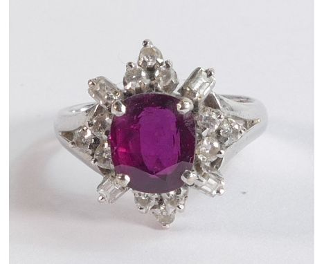 18ct gold ruby &amp; diamond cluster ring, size M, main stone 8mm x 6mm, stamped 18k &amp; tested as such weight 5.27g 