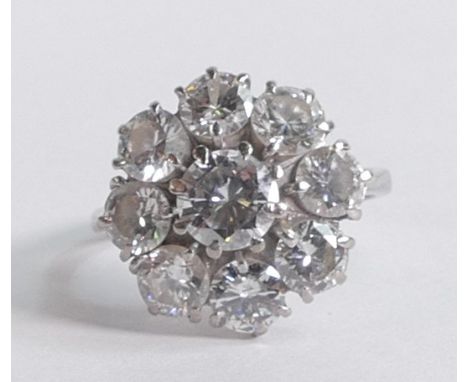 Large 3.4 carat natural diamond nine stone cluster ring, graded for clarity as SI - I1, colour H/I.  Centre stone just under 