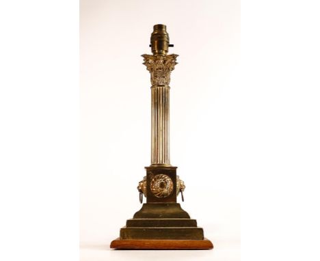 Victorian Corinthian column Brass lamp base converted from a candlestick. Fluted column with embossed Lion head handles and f