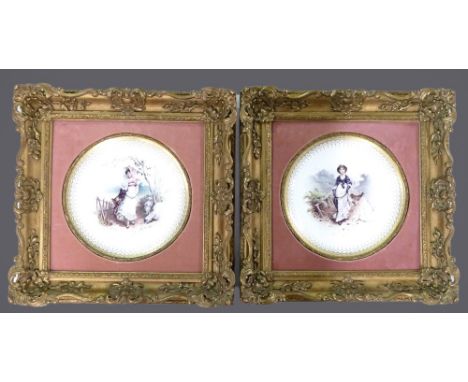 A pair of Minton gilded cabinet plates, each decorated with ladies in period costume by A Boullemier, d.23.5cm, mounted in or