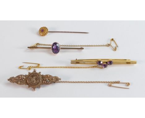 3 x 9ct gold brooches &amp; a 9ct stick pin.  Particularly nice single amethyst brooch, a decorative 9ct brooch, a 3 stone am